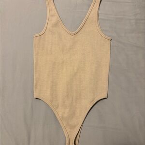 Womans Tan Ribbed Body Suit